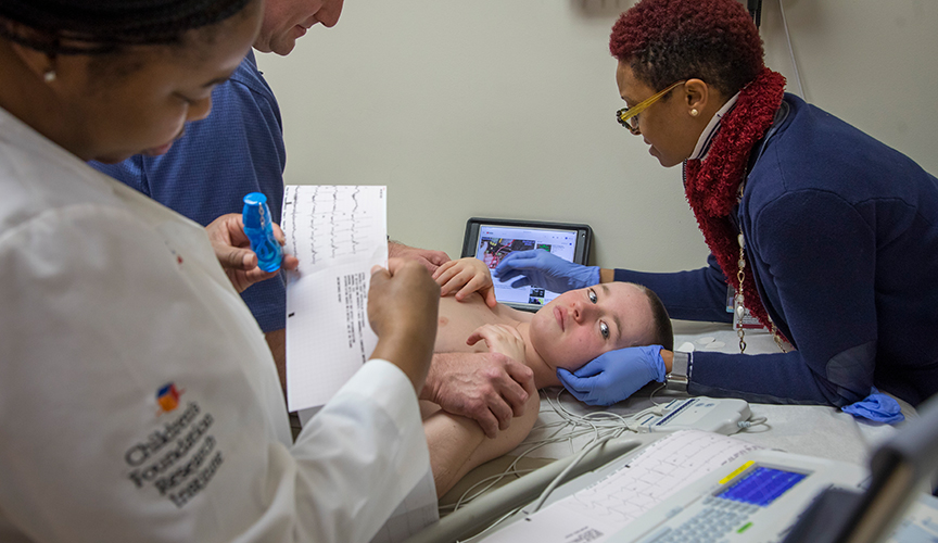 Le Bonheur patient Charlie Byrd being cared for in clinical trials by Dr. Tracee Ridley Pryor 